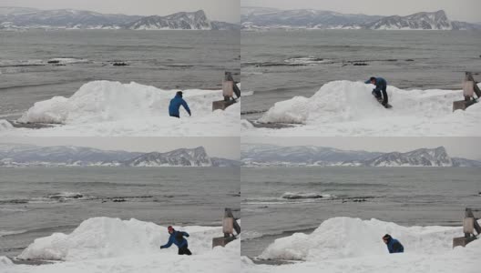 滑板手植物魔术惊人的海洋背景极端冬季运动动作镜头高清在线视频素材下载