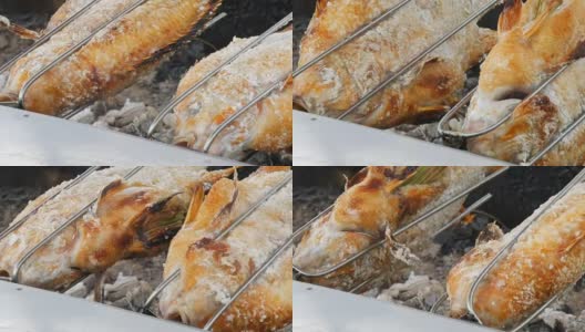 泰国国菜，炸鱼吐在盐和绿色近距离观看。泰国和亚洲的珍奇食物高清在线视频素材下载