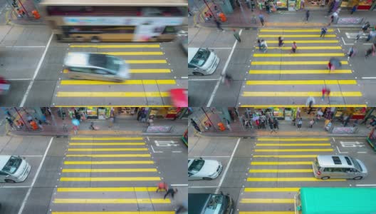 慢镜头:行人穿过香港九龙弥敦道旺角花园街市的人行横道高清在线视频素材下载
