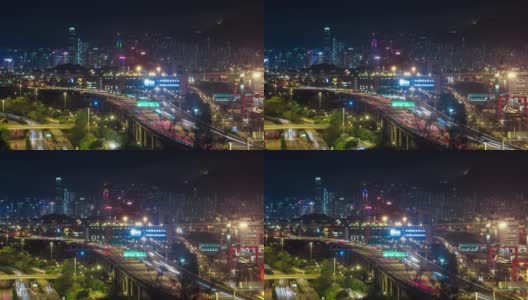 晚上香港市中心的城市天际线。车流的前灯高清在线视频素材下载