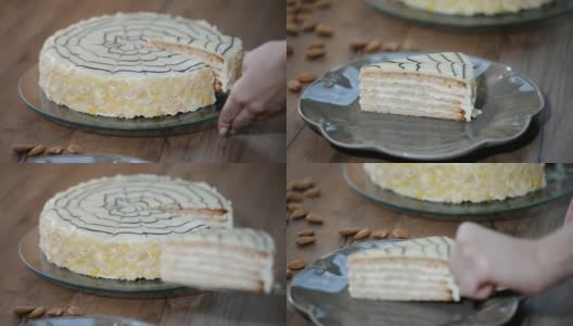 传统的匈牙利酯蛋糕。女性手切蛋糕。高清在线视频素材下载