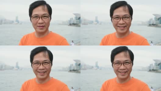 成熟的中国男子微笑的大头照高清在线视频素材下载