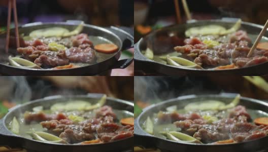 韩式腌猪肉烧烤在火锅上烤高清在线视频素材下载