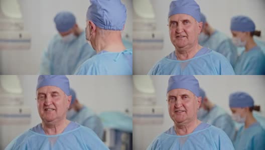 手术室里自信的高级外科医生高清在线视频素材下载