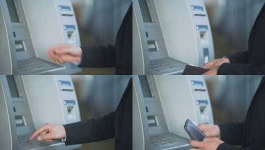 男性用手输入ATM键盘上的密码，从账户中取钱高清在线视频素材下载