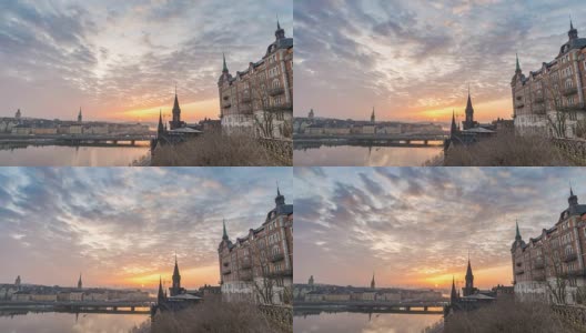 斯德哥尔摩城市天际线夜晚到白天日出的时间流逝在Gamla Stan和Slussen，斯德哥尔摩瑞典4K时间流逝高清在线视频素材下载