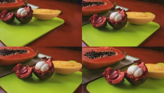 餐桌上有异国情调的热带水果。泰国的水果高清在线视频素材下载