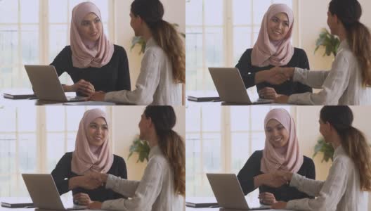 愉快的亚洲穆斯林经理握手白人女性客户在会议高清在线视频素材下载