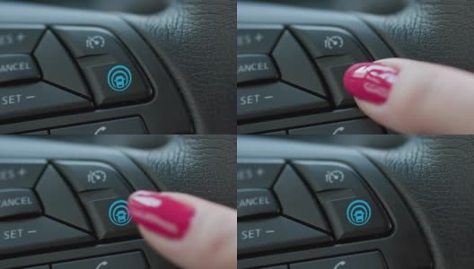 驾驶员启动自动驾驶模式。女性手指按下现代电动汽车的自动驾驶按钮。工作雷达交通传感器高清在线视频素材下载