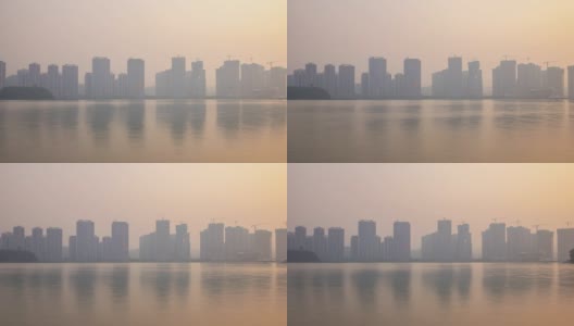 日落时间长沙城市湖泊海岸线巨型建设现代码头全景时间间隔4k中国高清在线视频素材下载