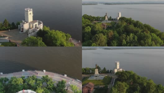 俄罗斯，哈巴罗夫斯克，2019年8月:无人机俯瞰穆拉维约夫-阿穆尔斯基的悬崖和纪念碑。阿穆尔河堤岸。高清在线视频素材下载