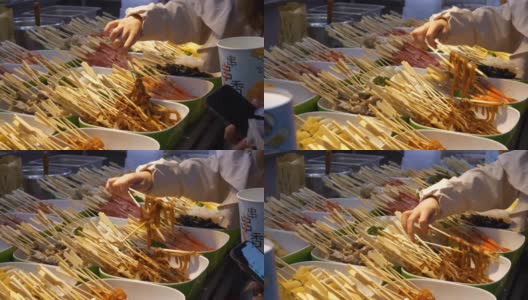 夜间时间青岛城市著名的街头小吃近距离慢镜头全景4k中国高清在线视频素材下载