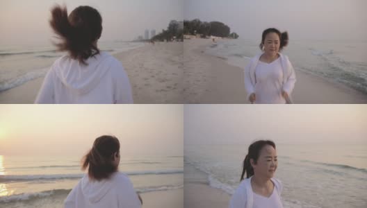 在海滩上跑步的成熟亚洲女人高清在线视频素材下载