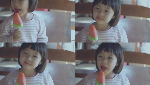 可爱的小女孩在吃冰淇淋高清在线视频素材下载