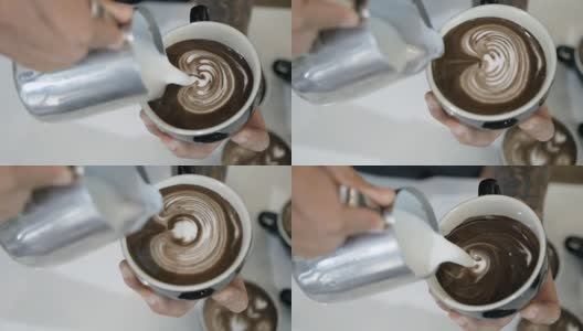 SLO MO用黑巧克力制作拿铁艺术。高清在线视频素材下载