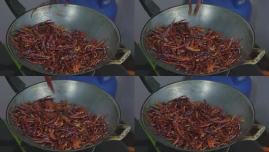 干红辣椒落在平底锅里高清在线视频素材下载