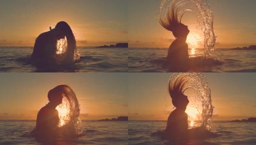剪影:一名年轻女子把她的头发甩到后面，在夕阳下泼水。高清在线视频素材下载