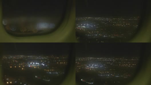飞机窗外的城市夜空高清在线视频素材下载