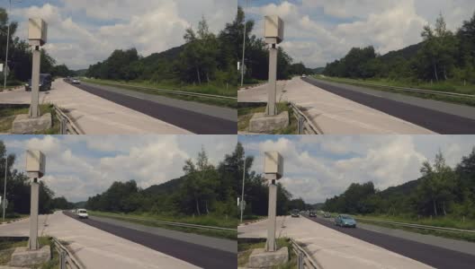 高速公路上有路边装有测速摄像头和雷达的汽车高清在线视频素材下载