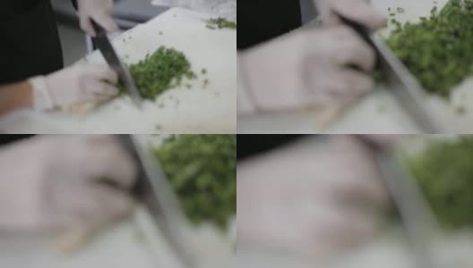 商业厨房食品准备-切葱/韭菜高清在线视频素材下载