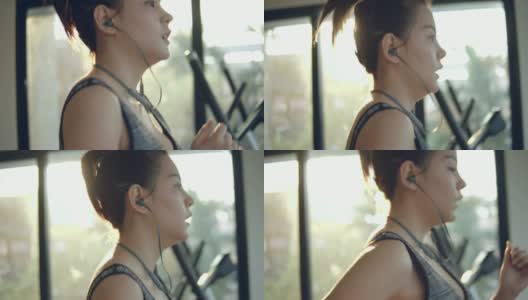 迷人的亚洲女人在健身房训练高清在线视频素材下载