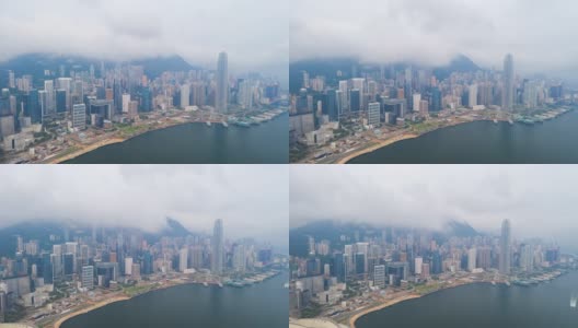 4K Hyperlapse:鸟瞰维多利亚港上空的摩天大楼，无人机俯瞰香港的发展建筑、交通、能源基础设施。亚洲金融和商业中心高清在线视频素材下载