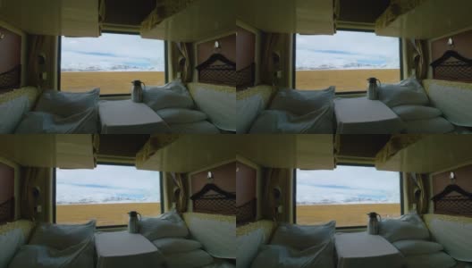 近距离观察:从卧铺列车的窗口可以看到西藏平原的风景。高清在线视频素材下载