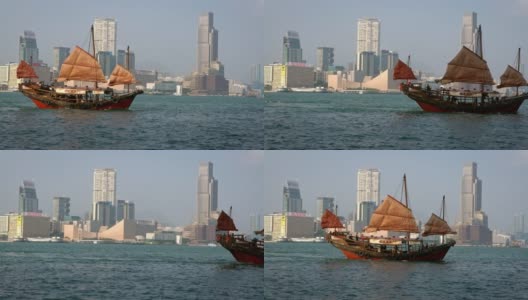 维多利亚港的4K舢板。中国风格的红色游轮高清在线视频素材下载