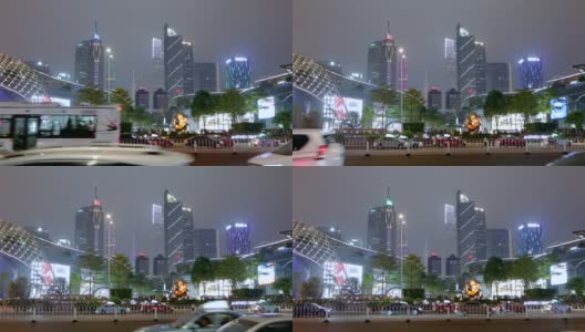 中国广州夜间道路上的交通。晚上马路上有很多车，高大的现代建筑作为背景高清在线视频素材下载