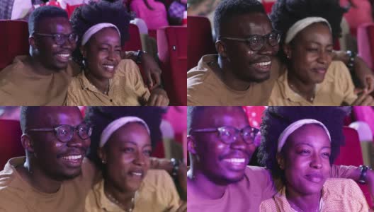 一对非洲裔美国夫妇在看浪漫电影，在电影院玩得很开心高清在线视频素材下载