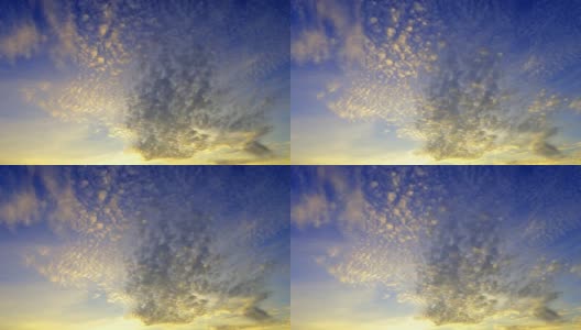黄色的日出或日落卷积云在深蓝色的天空高清在线视频素材下载