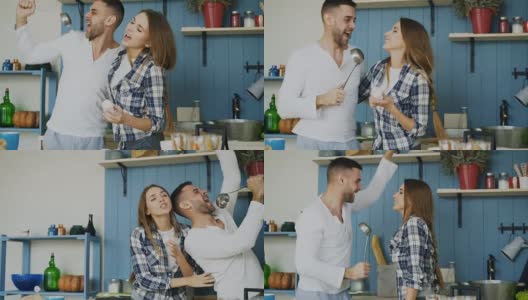快乐的年轻夫妇在厨房里跳舞唱歌，早上在家听音乐高清在线视频素材下载