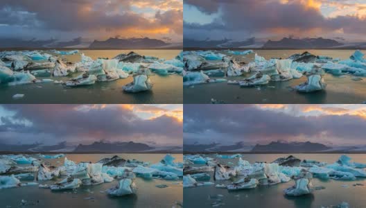 日落时分，冰岛东南部Vatnajkull国家公园附近Jökulsárlón冰川泻湖水域中的冰川。缩小。4 k UHD间隔拍摄。高清在线视频素材下载