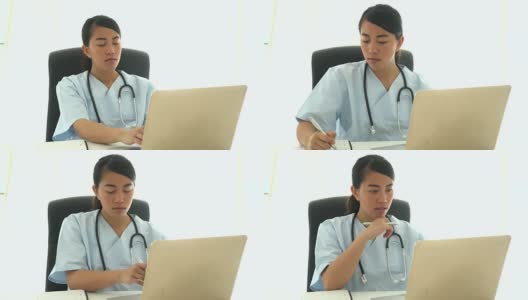 亚洲医生在电脑上分析医疗结果并做笔记高清在线视频素材下载