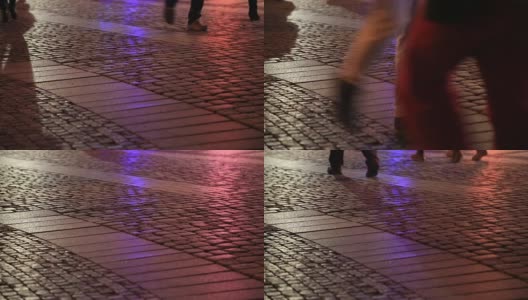 人们走在鹅卵石街道上的影子高清在线视频素材下载