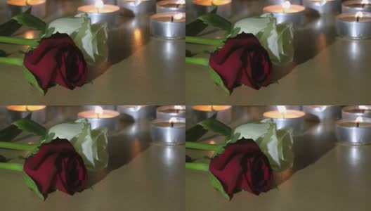 抽象蜡烛灯燃烧和玫瑰花纹理高清在线视频素材下载