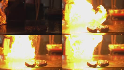 慢镜头烹饪日本和牛牛肉烧烤铁板烧与火焰高清在线视频素材下载