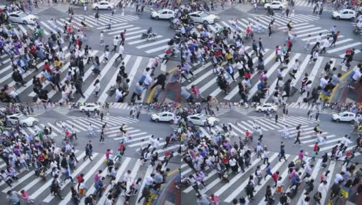 一群人走在中国城市的人行横道上高清在线视频素材下载