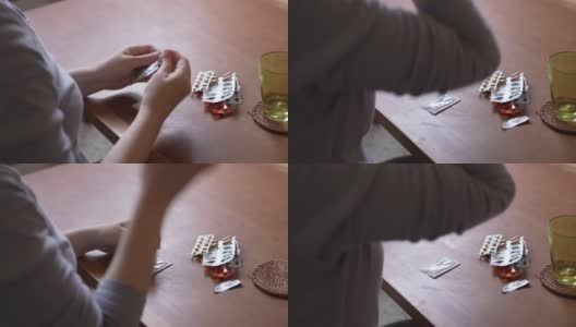 一个正在吃药的女人。高清在线视频素材下载