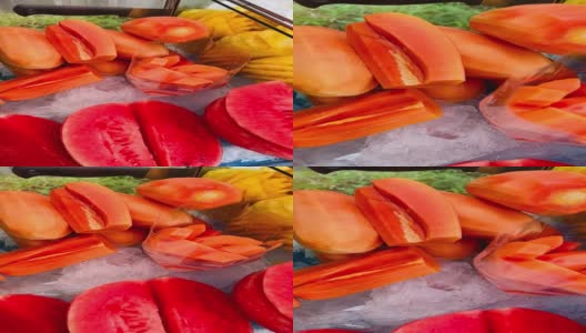 切片木瓜水果在推车的街头食物高清在线视频素材下载