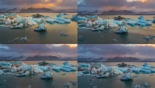 日落时分，冰岛东南部Vatnajkull国家公园附近Jökulsárlón冰川泻湖水域中的冰川。缩小。4 k UHD间隔拍摄。高清在线视频素材下载