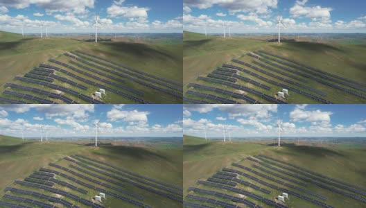 风力涡轮机农场和太阳能电池板的鸟瞰图高清在线视频素材下载