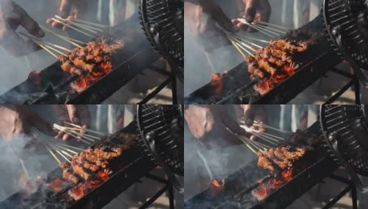 烤鸡沙爹用传统的炭火烤高清在线视频素材下载