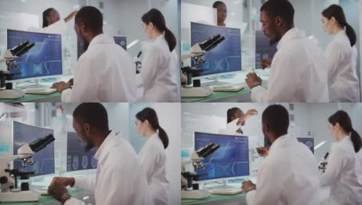 非洲和亚洲的科学家正在研究DNA样本。带有DNA序列和脑波扫描的电脑屏幕。专注于工作高清在线视频素材下载