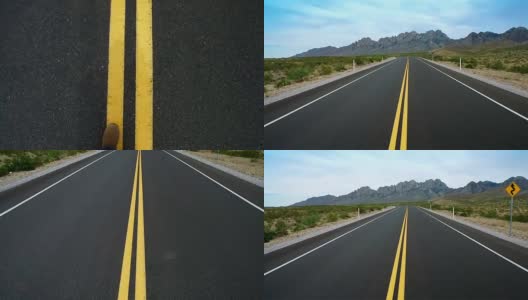 沙漠空旷的高速公路中心车道步行从脚向上看的标志高清在线视频素材下载