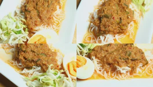 泰式粉丝配鱼露或泰国名菜Kanom Jeen高清在线视频素材下载