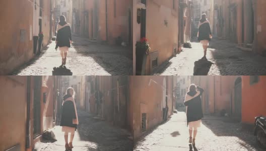 一个年轻的女游客在阳光明媚的日子里走在一条小街上。女孩在欧洲度假，探索古城高清在线视频素材下载