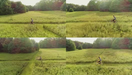 15岁少女骑自行车在草地上的小径在ed. Poconos，宾夕法尼亚州高清在线视频素材下载