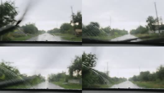 下雨了。雨点落在汽车玻璃上高清在线视频素材下载
