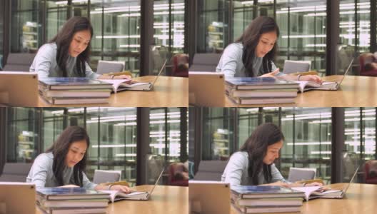 亚洲女人在图书馆看书高清在线视频素材下载